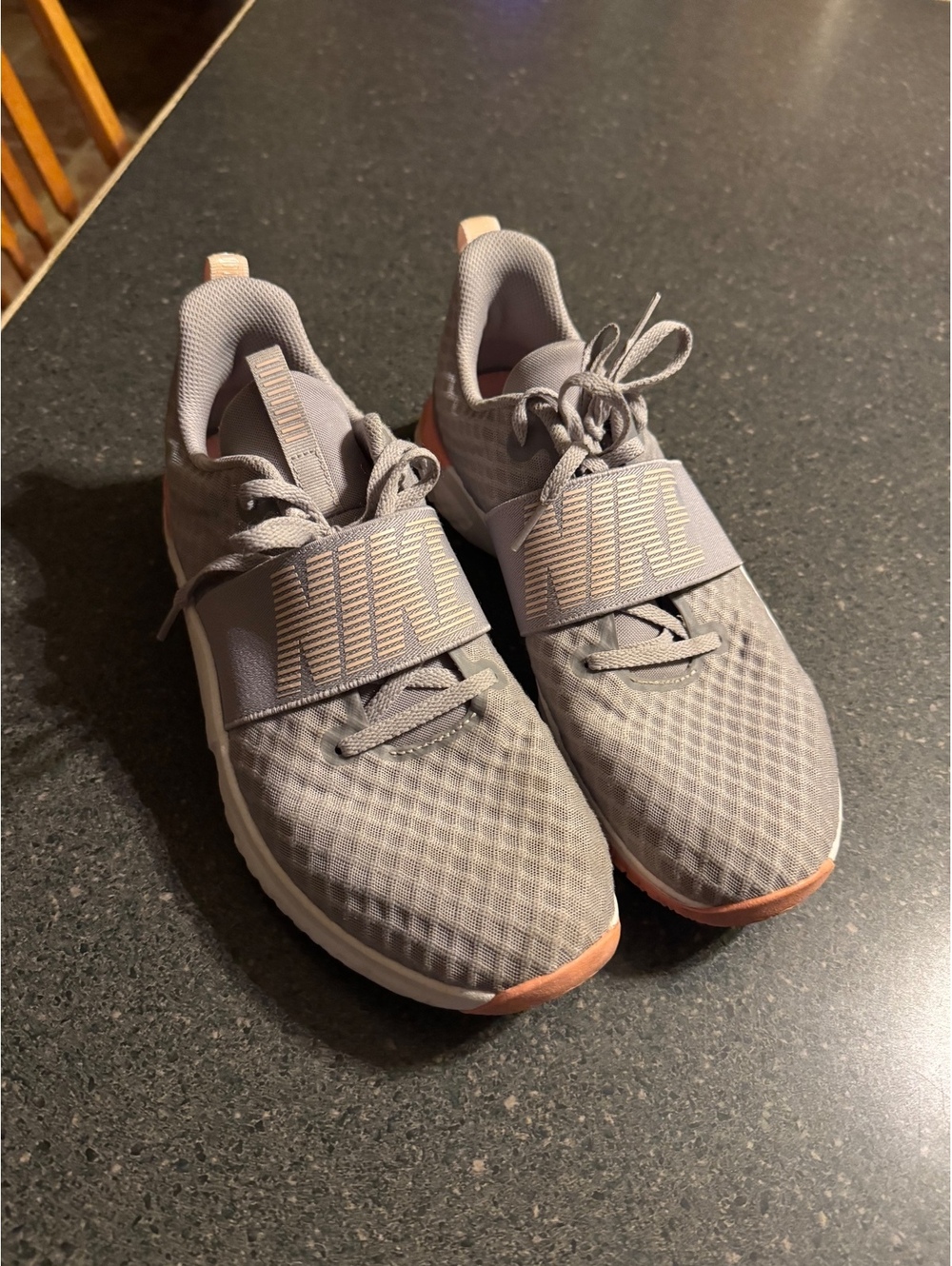 Size 11 women’s Nike shoes grey pink running